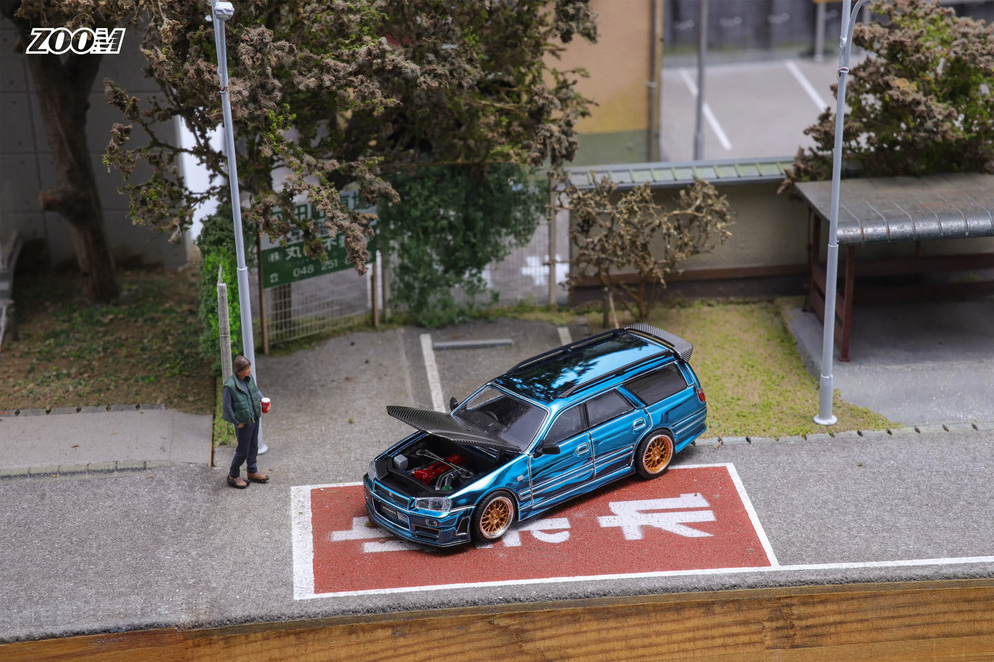 Modelo de coche en fundición a presión ZOOM 1:64 Stagea WC34 260RS en color azul carbono/blanco